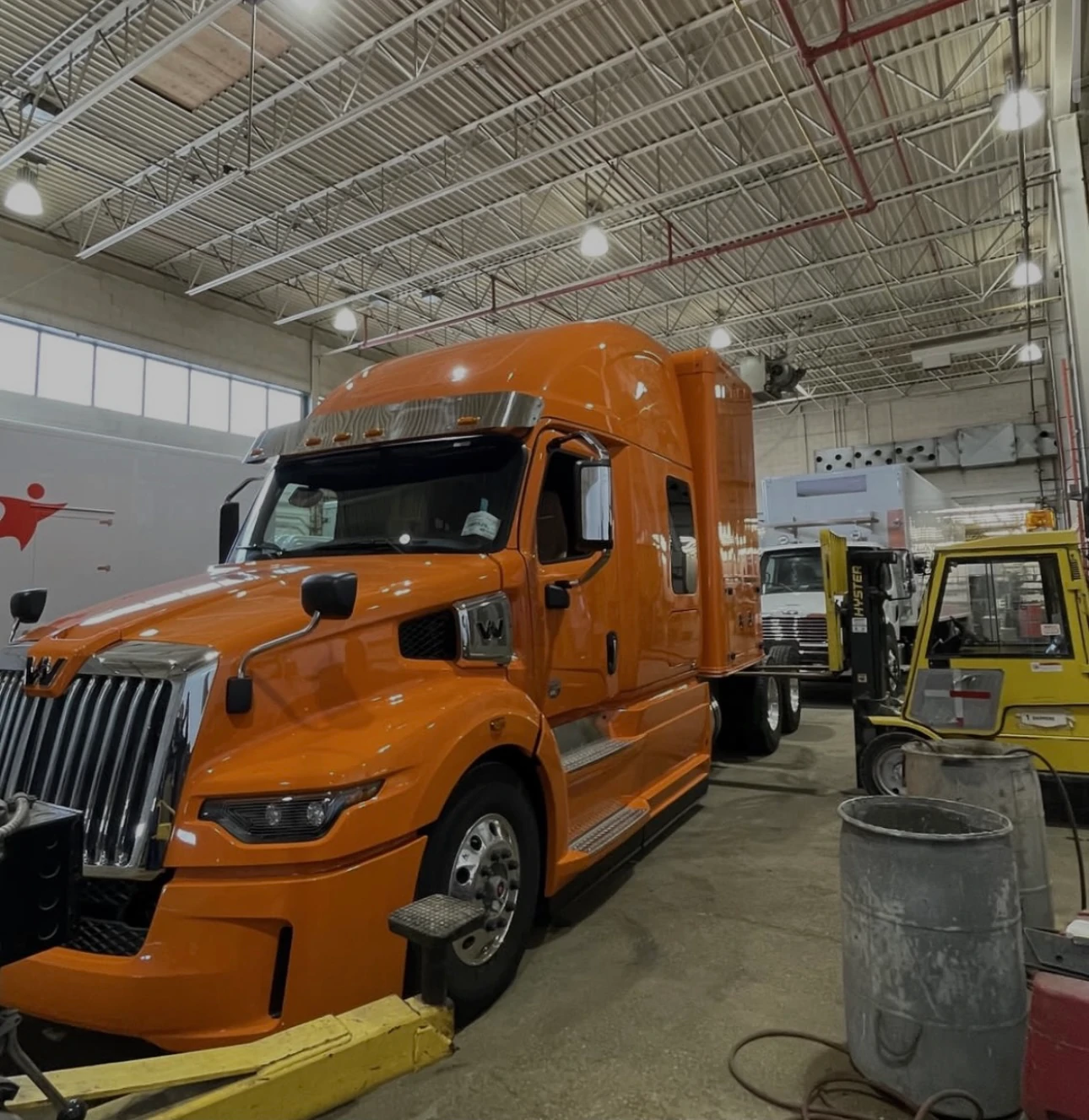 High Bay Shop Lights Efficiency Manitoba Upgrade Western Star Orange Paint LiORA Electric Manitoba Electrical Contractor
